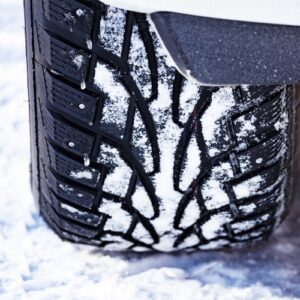 snow tire driving through heavy snow