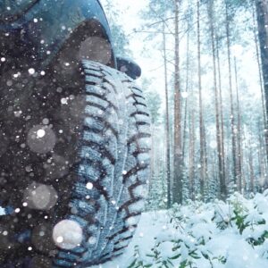 snow tire driving through heavy snow