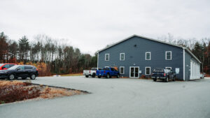 exterior of chichester location with all garage doors open